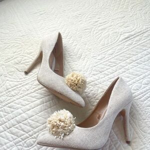 Cream pompom pumps